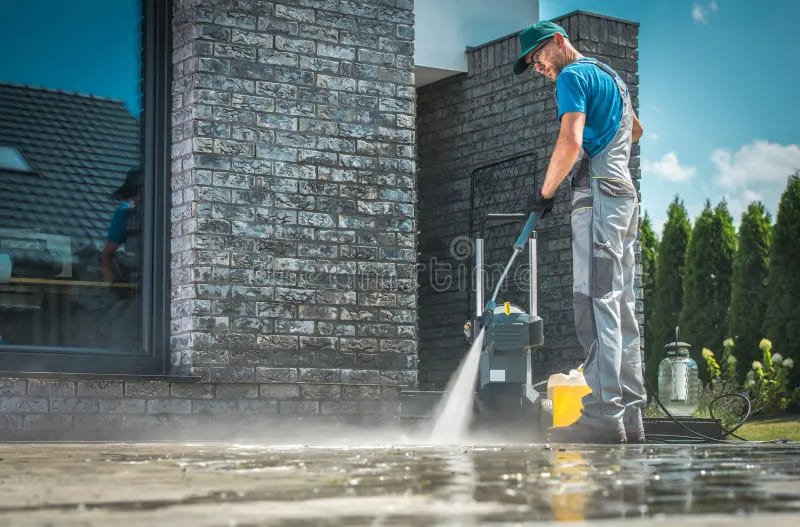 Pressure washing for building exteriors and parking